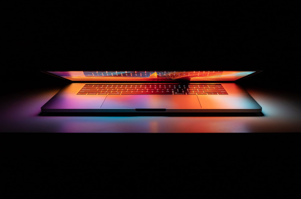This laptop looks super fancy A fancy looking laptop with the lid half-closed