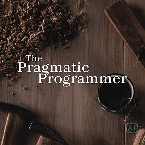 The pragmatic programmer sentence on top of a carpentry workbench as a way to think of programming like a craft